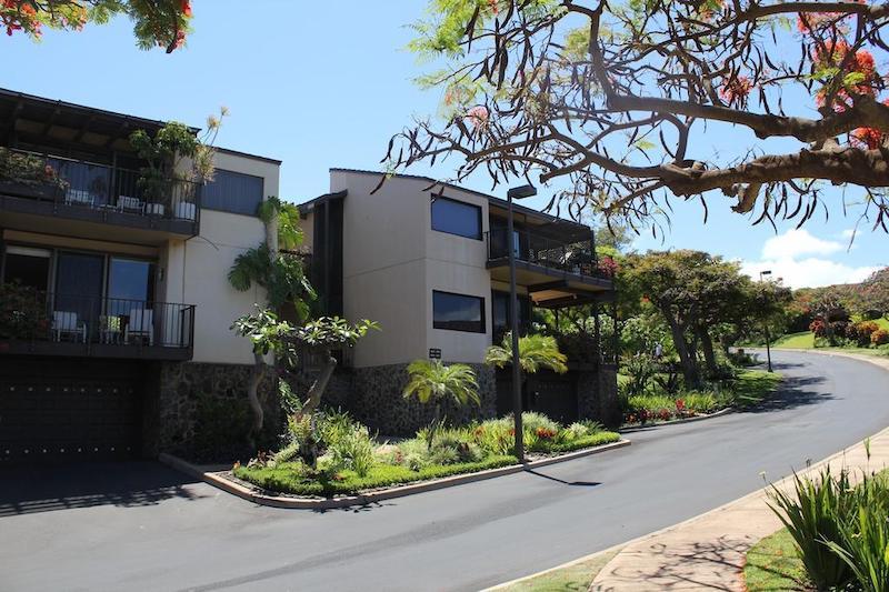 Spacious driveway and mature landscaping