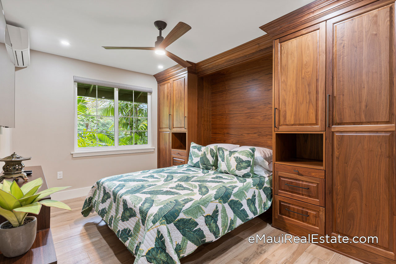 Guest bedroom on the second floor of townhome style unit